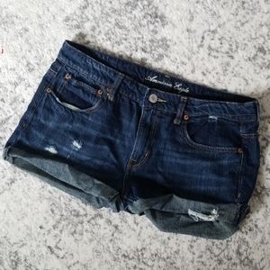 Distressed raw edge AE shorts, size 12